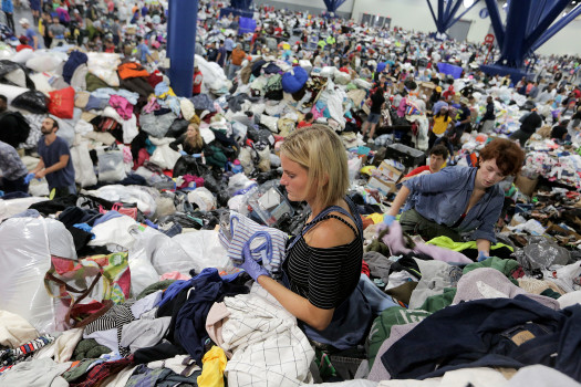 Kathryn Loder sorts donated clothing